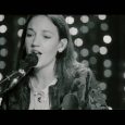 Underneath the twinkling glow of fairy lights French rising star Jain performs her forthcoming single, Heads Up, dressed in her favourite Emporio Armani look …